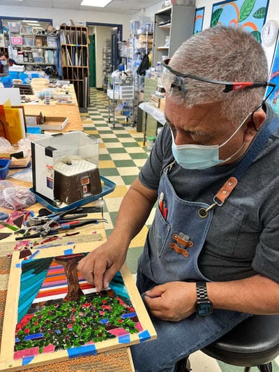 Artist Jose works on the Teller Commission